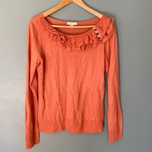 Ruffle neck sweater with jewel buttons on collar